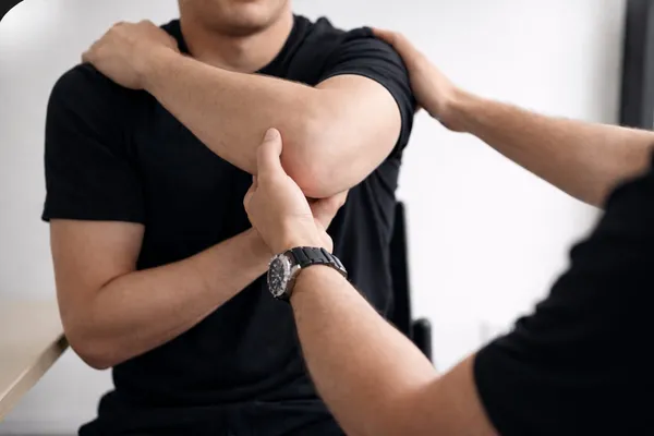 Physiotherapist treating post-accident injuries